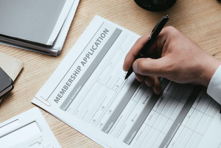 cropped view of man filling in Membership Application Form Register Concept